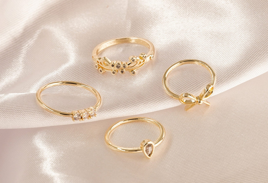 Set X 4 Anillos Cristal Moño Dorados Ref: J129